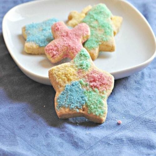 Homemade Sugar Cookies Recipe shown on plate with blue tablecloth