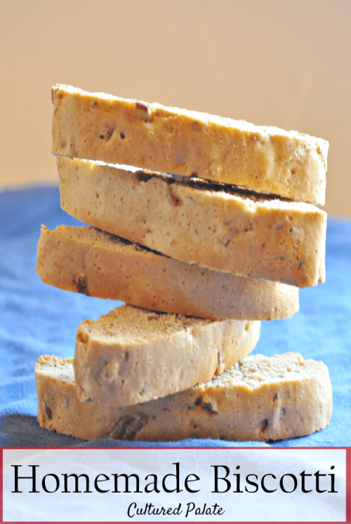 Homemade Pecan Biscotti Recipe shown stacked on blue table