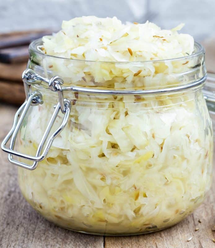 A close up of Homemade Sauerkraut made from the Homemade Sauerkraut Recipe in a mason jar