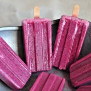 A close up of pink yogurt Popsicles