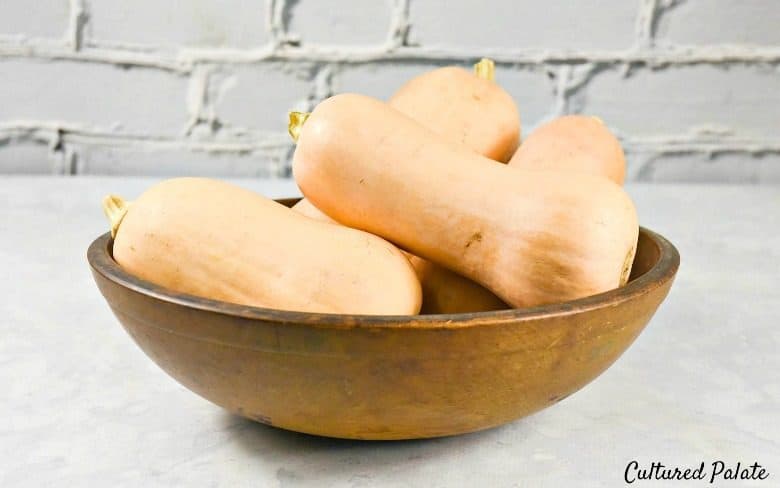 Wooden bowl with butternut squash