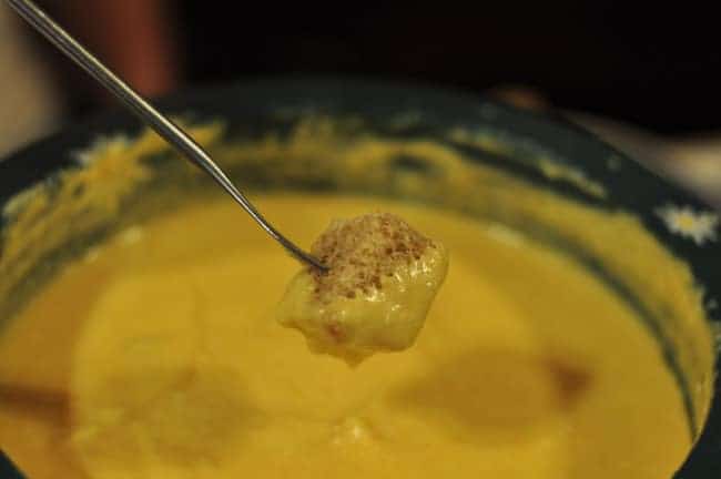bread dipped in fondue