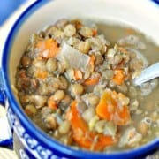 Middle Eastern Lentil Soup Recipe shown in bowl with spoon
