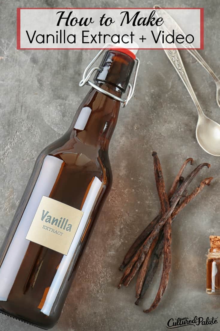 Brown bottle of homemade vanilla extract shown with vanilla beans and spoons from the post How to Make Vanilla Extract with text overlay.
