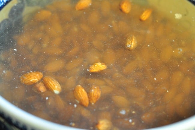 A photos of soaking nuts in a big bowl of water
