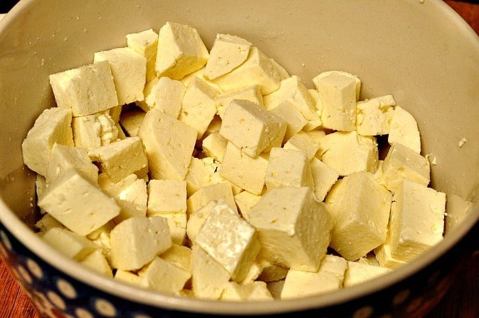 homemade feta cheese in a bowl, a recipe for how to make feta cheese
