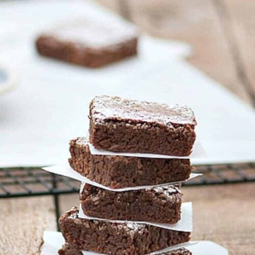 The Best Brownies made from the Easy Brownie Recipe stacked on table