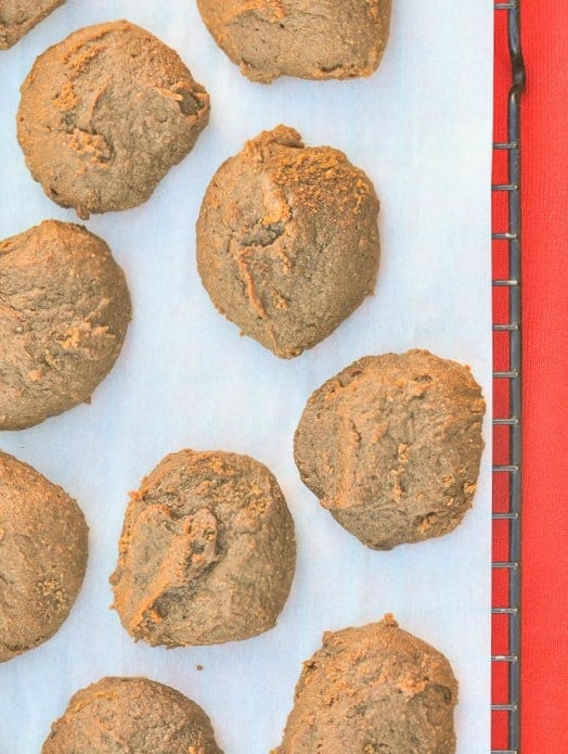 An overhead shot of pumpkin spice cookies on cooling rack