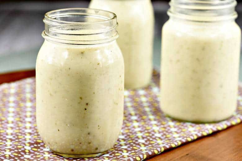 Homemade Cream of Chicken Soup in a glass jar on a table