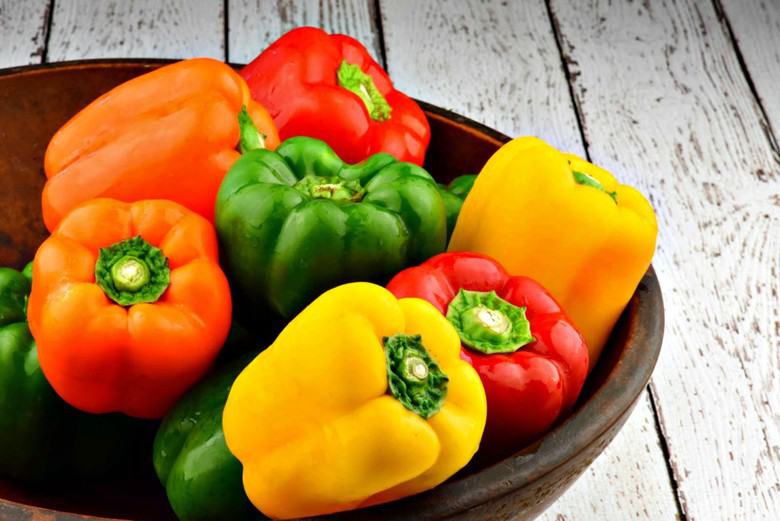 bright colored peppers in a bowl ready to make easy stuffed bell peppers