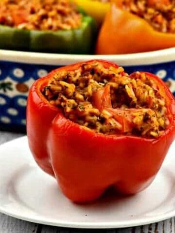 A close up of easy stuffed bell peppers stuffed with Italian seasonings