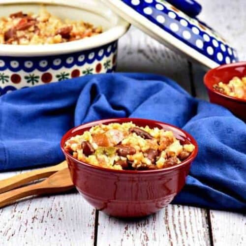 Spicy kidney beans and rice in a small red bowl