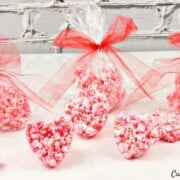 heart shaped popcorn balls in red and pink wrappers