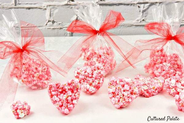 heart shaped popcorn balls in red and pink wrappers