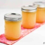 how to make chicken broth - 3 jars of broth shown