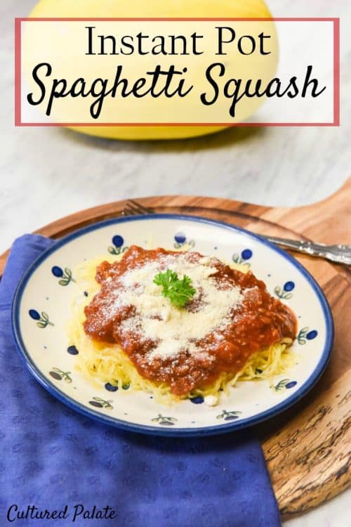 Instant Pot Spaghetti Squash shown on plate with tomato sauce ready to eat