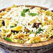 Italian Pasta Salad shown in a wooden bowl ready to serve