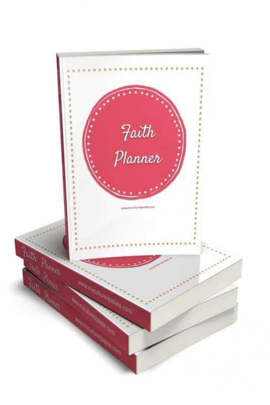 Vertical image of the Faith Planner - one standing on top of three laying down