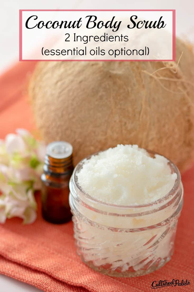 Coconut Body Scrub Recipe shown in glass jar with coconut and essential oil around it and text overlay.