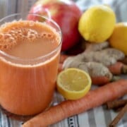 Indian Style Carrot Juice Recipe shown ready to drink in glass.