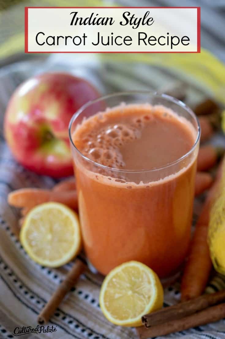 Indian Style Carrot Juice Recipe shown in glass with napkin, fruit and veggies and text overlay.