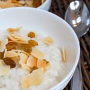 rice in a bowl with coconut and raisins