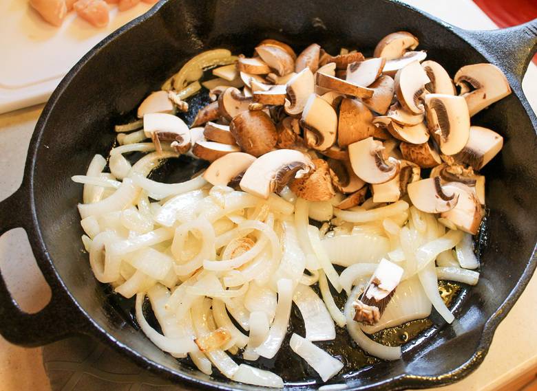 mushrooms and onions in skillet