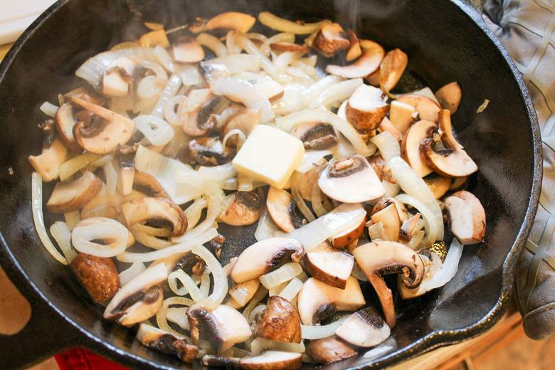 mushrooms and onions in skillet